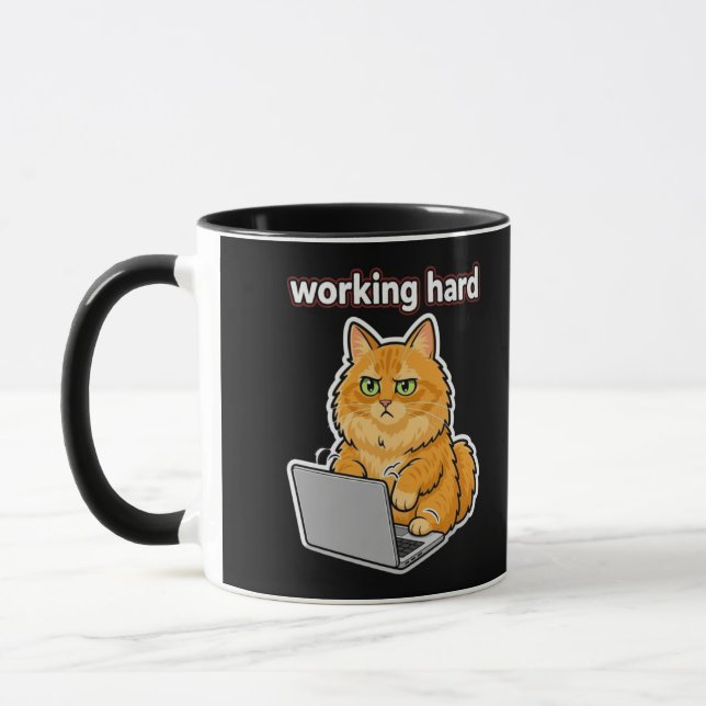 Funny ginger Cat Working Hard Meme mug (Left)