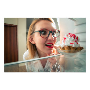 Funny girl looking in refrigerator  photo print