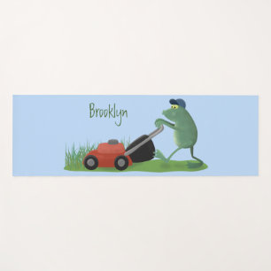 Funny green frog mowing lawn cartoon yoga mat