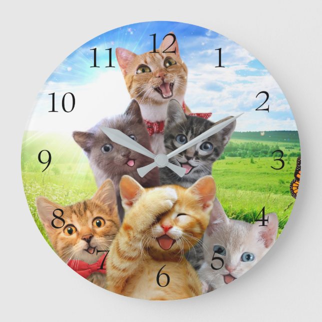 Funny kittens in green field.                      large clock (Front)