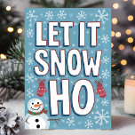 Funny Let It Snow Ho Snowman Christmas Holiday Card<br><div class="desc">Add a little humour to the holiday season with this cheeky "Let It Snow Ho" Christmas card. Featuring bold, stitched typography and a playful snowman, this design is perfect for those who love to combine festive cheer with a lighthearted, irreverent twist. Snowflakes and winter elements decorate the blue background, while...</div>