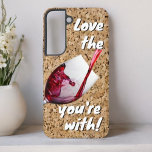 Funny Love The Wine You're With Message Samsung Galaxy Case<br><div class="desc">With a cork background and a glass of red wine in pouring action this phone case makes a fun gift idea for the wine lover.  Personalise or remove the text,  or edit using the design tool to select a font style,  size and colour you like.</div>