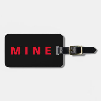 Funny luggage tag with 'Mine' written on it