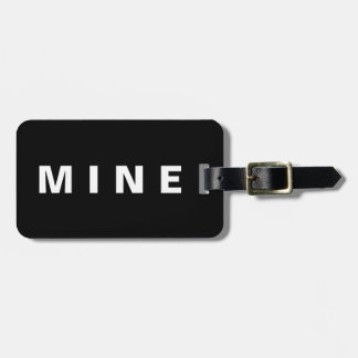 Funny luggage tag with 'Mine' written on it