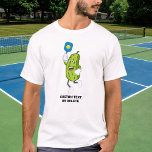 Funny Pickle Playing Pickleball Custom Text<br><div class="desc">The perfect shirt for a pickleball fanatic.  Design features a pickle playing pickleball.  Add custom text to personalise or delete.</div>