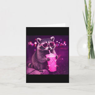 Funny pink racoon drinking iced coffee - cute card