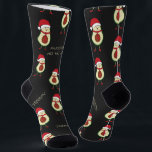 Funny Pun Avocado Red Black Socks<br><div class="desc">Give him a laugh with these black Christmas holiday "AVOCAD HO HO HO" customisable socks, featuring a cute avocado guys with red ties and placeholders for two different names or words of your choosing. True One Size Fits All (Size 5 Female to Size 11 Male), 200 Needle Knit Polyester Socks....</div>