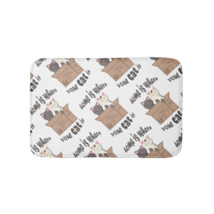 Funny quote Home is where your cat is Bath Mat
