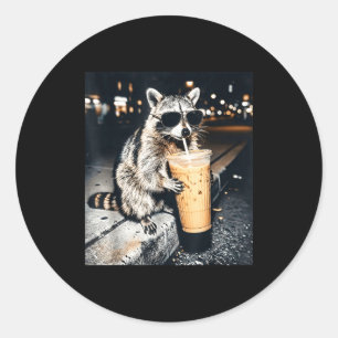 Funny raccoon drinking iced coffee classic round sticker