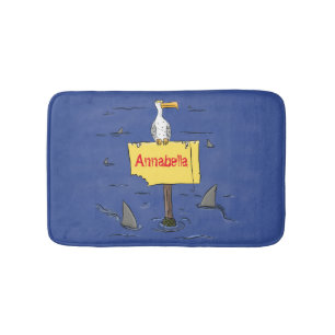 Funny sea bird circled by sharks cartoon bath mat