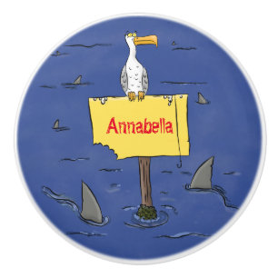 Funny sea bird circled by sharks cartoon ceramic knob
