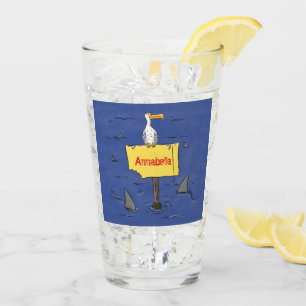 Funny sea bird circled by sharks cartoon glass