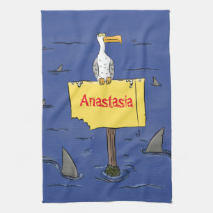 Funny sea bird circled by sharks cartoon tea towel