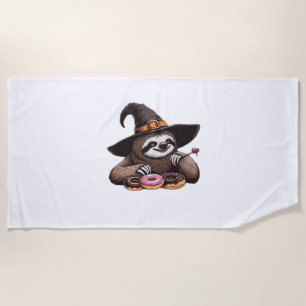 Funny Sloth in Witch Hat Enjoying Doughnuts - Cute Beach Towel