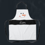 Funny Snowman Face Christmas Personalised Baking Apron<br><div class="desc">Get in the holiday spirit with this Funny Snowman Face Christmas Personalised Kitchen Apron.  This cute snowman is on a an all white background with black straps.  Name is in aesthetic handwriting font on black horizontal stripe for snowman's scarf.
Click personalise template option and enter name.</div>