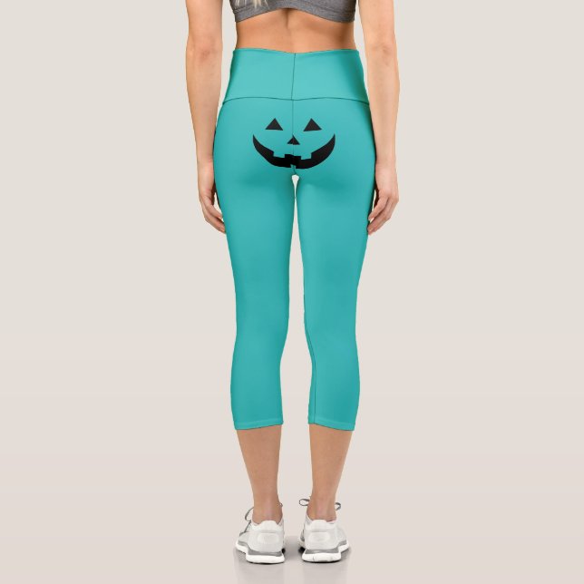 Funny teal Jack o lantern pumpkin face Halloween Capri Leggings (Back)
