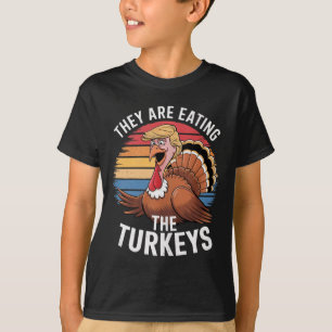 Funny They Are Eating The Turkeys Thanksgiving Hum T-Shirt