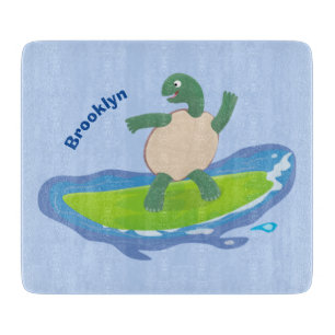 Funny tortoise wave surfing cartoon cutting board