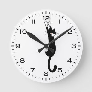 Funny Tuxedo Cat Hanging On Black and White Round Clock