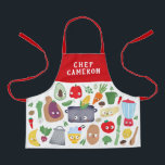 Funny Vegetable Fruit Faces Chef Kids Apron<br><div class="desc">This fun personalised apron features vegetables, fruit, kitchen utensils, a cutting board, a pot, and even a blender, most with silly faces. The top and straps are a solid red, but they can be customised to any colour you'd like. Easy to customise for a unique gift, perfect for the young...</div>