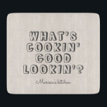 Funny what's cooking good lookin'  cutting board<br><div class="desc">Funny what's cooking good lookin' beige cutting board</div>