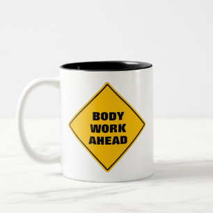 Funny yellow body work ahead caution road sign Two Two-Tone Coffee Mug