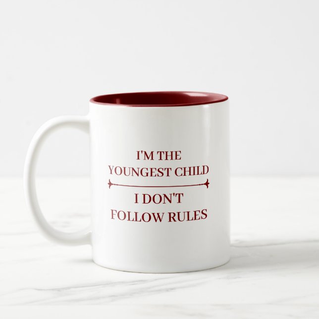 FUNNY YOUNGEST CHILD COOL QUOTES CUSTOMIZED NAME Two-Tone COFFEE MUG (Left)