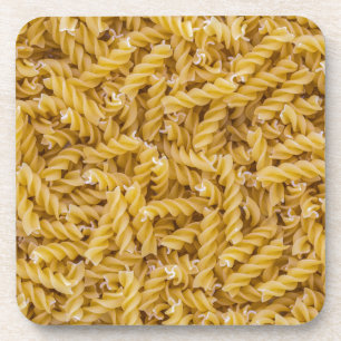 Fusilli pasta macro as background structure coaster