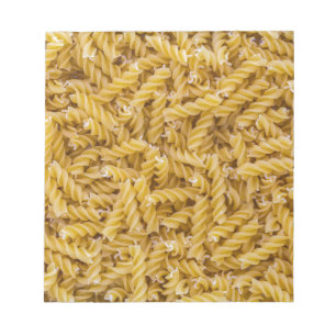 Fusilli pasta macro as background structure notepad