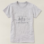 Future Mrs Chic Script Custom Name Bride to be T-Shirt<br><div class="desc">Future Mrs modern custom name t-shirt with the text Mrs in black elegant script calligraphy. Simply add the married name of the bride to be and the perfect bridal shower gift is ready for you to give. Exclusively designed for you by Happy Dolphin Studio.</div>