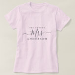 Future Mrs Chic Script Custom Name Bride to be T-Shirt<br><div class="desc">Future Mrs modern custom name pink t-shirt with the text Mrs in black elegant script calligraphy. Simply add the married name of the bride to be and the perfect bridal shower gift is ready for you to give. Exclusively designed for you by Happy Dolphin Studio.</div>