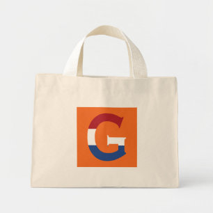 G Monogram overlaid on NLD Flag on or ttcnt Mini Tote Bag