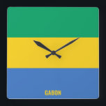 Gabon Flag Dazzling Patriotic Square Wall Clock<br><div class="desc">Gabon Flag Dazzling Patriotic Square Wall Clock in the colors and the elements of the Gabon national flag covering the front of the clock. National flag colors are complemented with the text "Gabon" on the bottom. Text is fully customizable using "Customize it!" feature. Feel free to change it, remove it...</div>