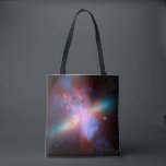 Galaxy M82 Tote Bag<br><div class="desc">This image shows a stunning view of a Starburst galaxy produced by space telescopes. M82 is a galaxy about 12 million light years from Earth that is undergoing a burst of star formation. X-rays from Chandra (blue) show gas being blasted away from the galaxy's disc as a bounty of stars...</div>