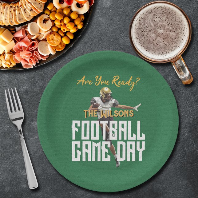 Game On Football Player on Green Paper Plate (Game on football player on green paper plates)