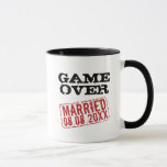 Game Over funny coffee mug with wedding date stamp<br><div class="desc">Game Over funny coffee mug with wedding date stamp. Fun wedding day gift idea for newlywed couple and honeymooners. Personalise this present for bride and groom. Vintage style design with red rubber stamp marking date of marriage. Cool party favour gift for the bachelor, husband and wife, guests etc. Custom cups....</div>