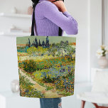 Garden at Arles | Vincent Van Gogh Tote Bag<br><div class="desc">Garden at Arles (1888) by Dutch post-impressionist artist Vincent Van Gogh. Original artwork is an oil on canvas depicting a lush landscape of colourful flowers. 

Use the design tools to add custom text or personalise the image.</div>