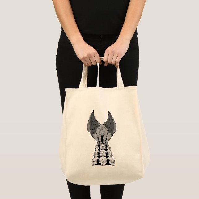 Gargoyle demon over skulls tote bag (Front (Product))