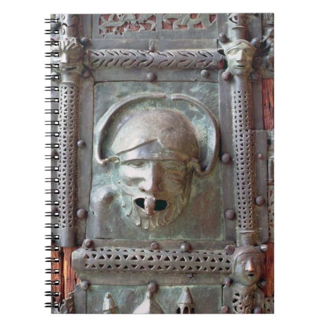 Gargoyle panel from the left door of the portal, 1 spiral notebook (Front)