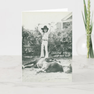 Garlene Tindall standing on a trick horse. Card