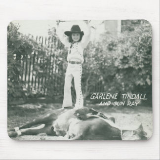 Garlene Tindall standing on a trick horse. Mouse Pad