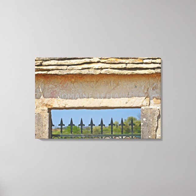 Gate and key stone carved with Montrachet, Canvas Print (Front)