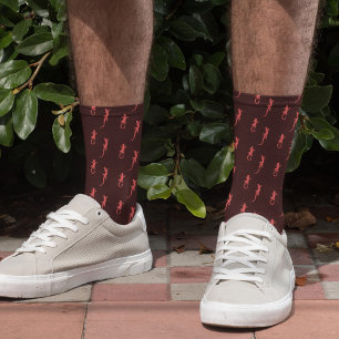 Geckos in red climbing up (on dark) socks