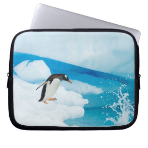 gentoo penguin, Pygoscelis Papua, jumping off Laptop Sleeve