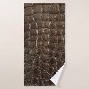 Genuine brown alligator leather, close up to show  bath towel