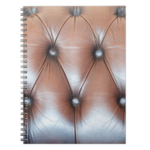 Genuine leather upholstery background,  luxury dec notebook