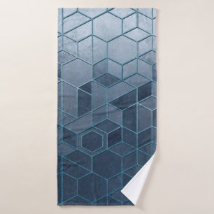 Geometric abstraction of hexagons on a blue relief bath towel