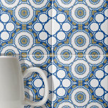 Geometric Blue and White Moroccan Azulejos Tile<br><div class="desc">This ceramic tile features a harmonious blend of geometric and floral elements. The tile is adorned with a series of concentric circles, each layer boasting a different pattern and shade, creating a mesmerising visual effect. The outermost layer is chraacterised by bold blue outlines that form hexagonal shapes. These hexagons encapsulate...</div>