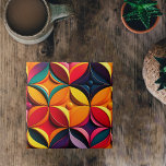 Geometric Colourful Floral Artwork Tile<br><div class="desc">A geometric design that features bold, angular shapes and repeating patterns that are symmetrically arranged. This type of Art Deco pattern was popular in the 1960s and is chraacterised by its use of strong colours, sharp lines, and geometric shapes. In this case, the tiling pattern is colourful, featuring a range...</div>