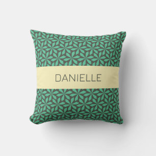 geometric green and yellow motif cushion